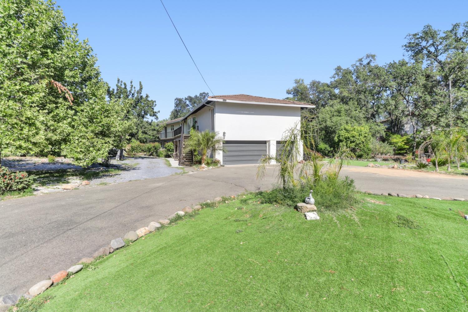 4330 Cavitt Stallman Road Granite Bay, CA 95746 - Photo 73 of 85 a front view of a house with garden