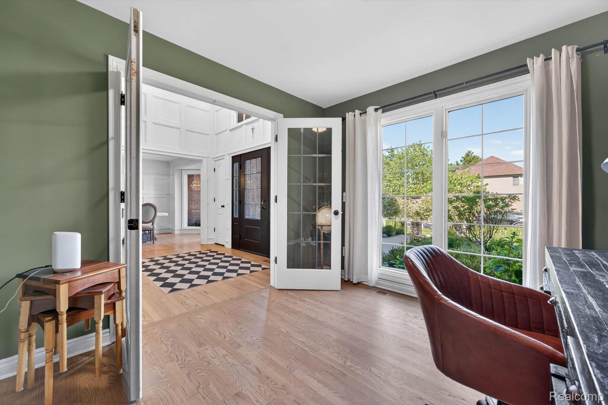 371 Lone Pine Circle Rochester, MI 48307 - Photo 10 of 59 Interior space with wood-finish flooring, large multi-pane windows, and a glass-paneled French door