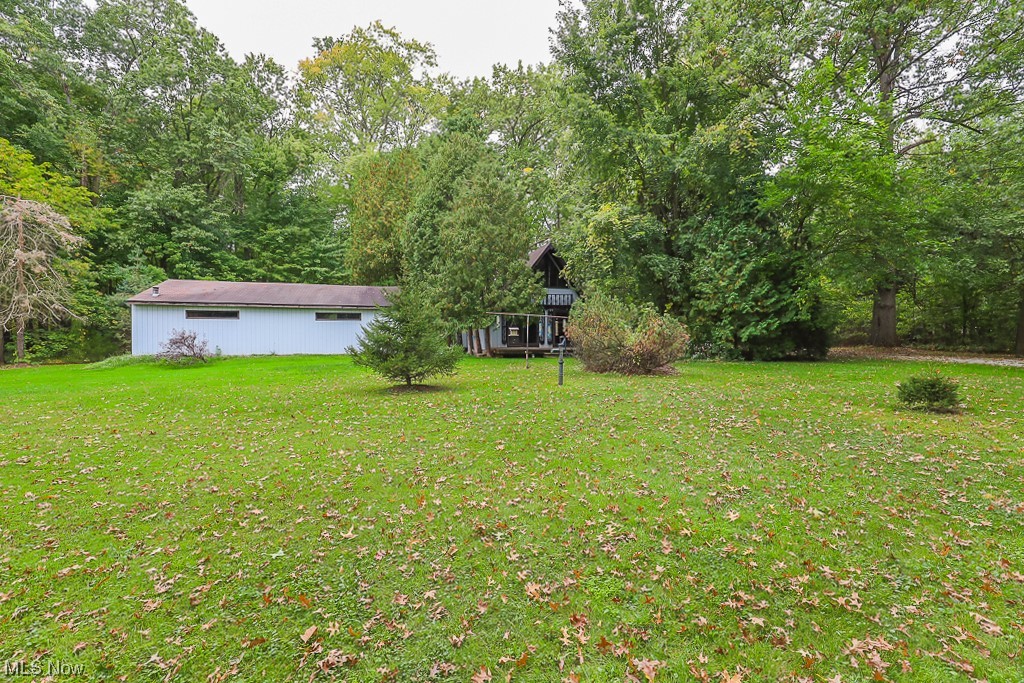 9920 Reed Road Grafton, OH 44044 - Photo 26 of 28 View of yard, front of home and back of garage