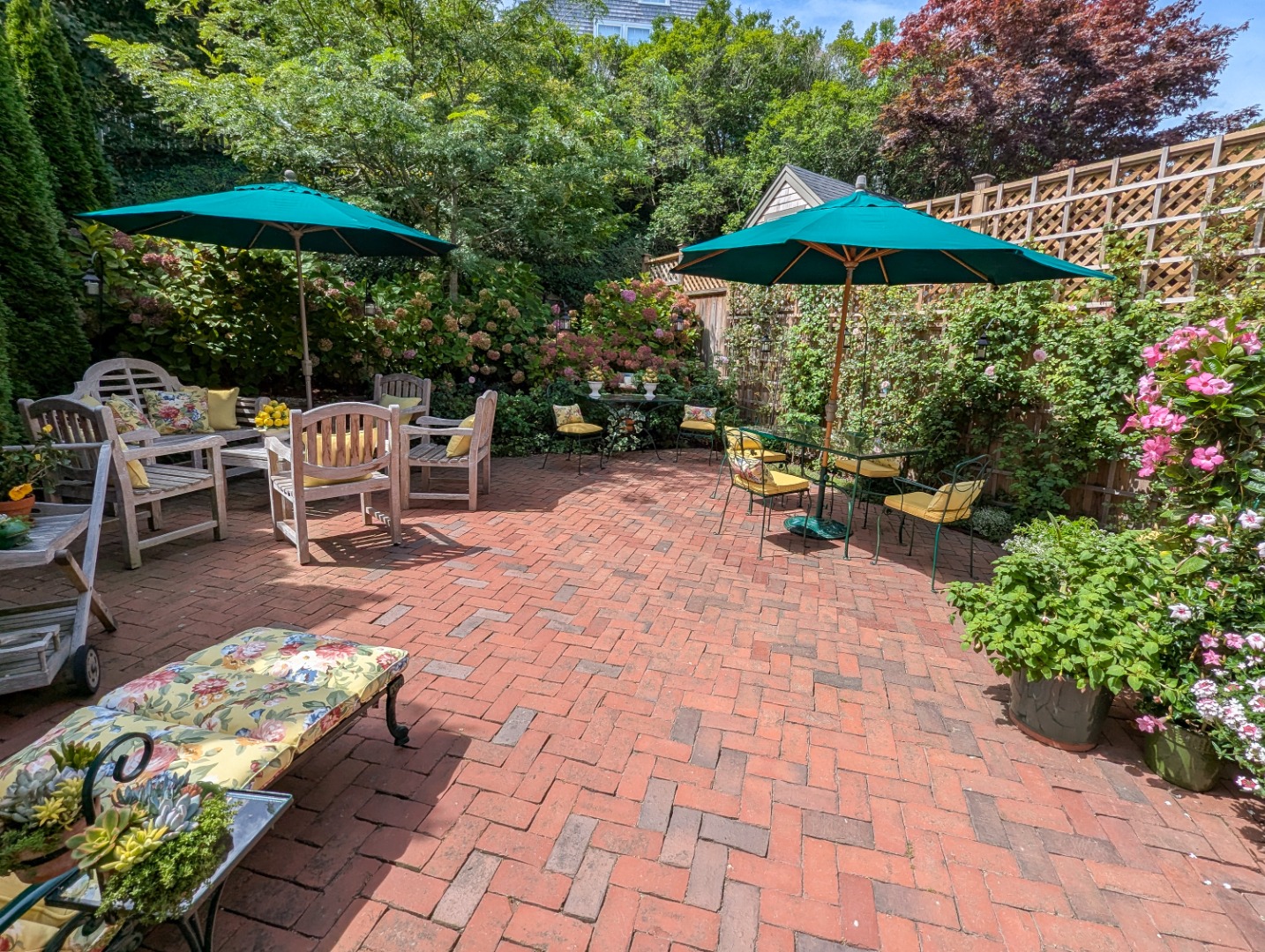 37 Union Street Nantucket, MA 02554 - Photo 6 of 25 a view of a backyard with sitting area