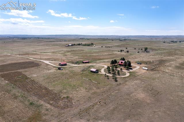 19350 Lemesany Road Calhan, CO 80808 - Photo 42 of 46 Aerial view featuring home and structures