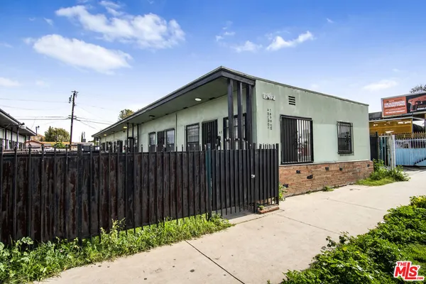 a front view of a house having yard