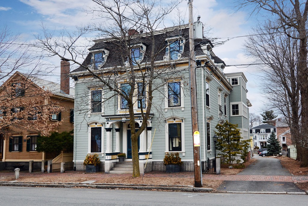 a front view of a building with street view