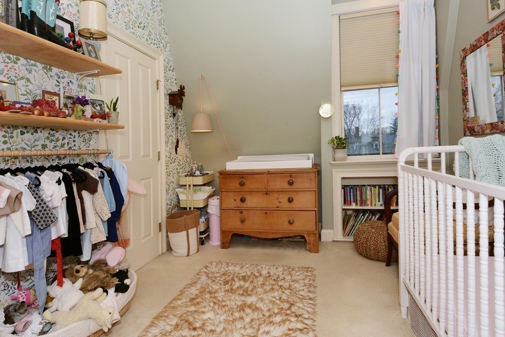 7 Winter Street, Unit 5 Salem, MA 01970 - Photo 31 of 41 a view of walk in closet with clothes and shoes
