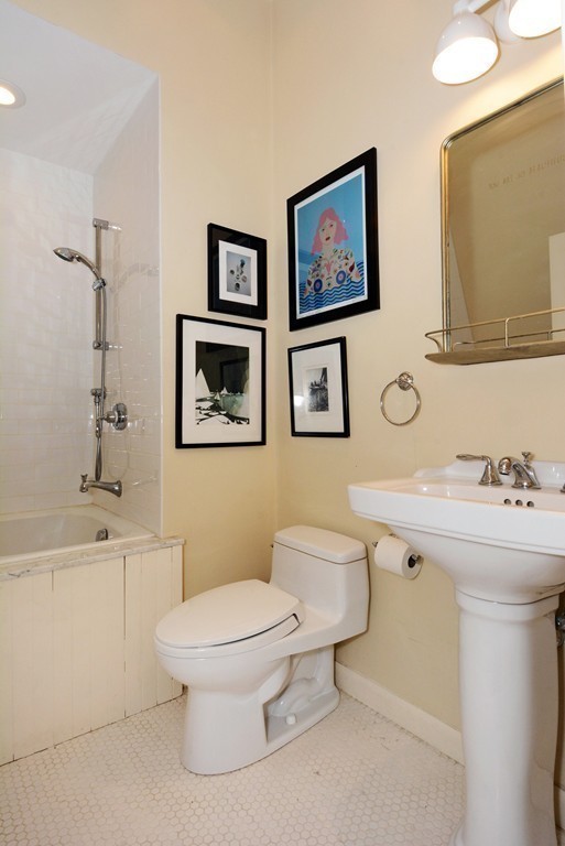 7 Winter Street, Unit 5 Salem, MA 01970 - Photo 34 of 41 a bathroom with a toilet sink and mirror