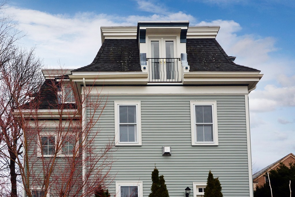 7 Winter Street, Unit 5 Salem, MA 01970 - Photo 38 of 41 a building that has a clock on it