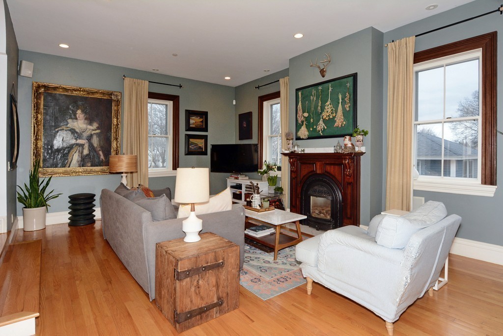 7 Winter Street, Unit 5 Salem, MA 01970 - Photo 8 of 41 a living room with furniture a fireplace and a flat screen tv