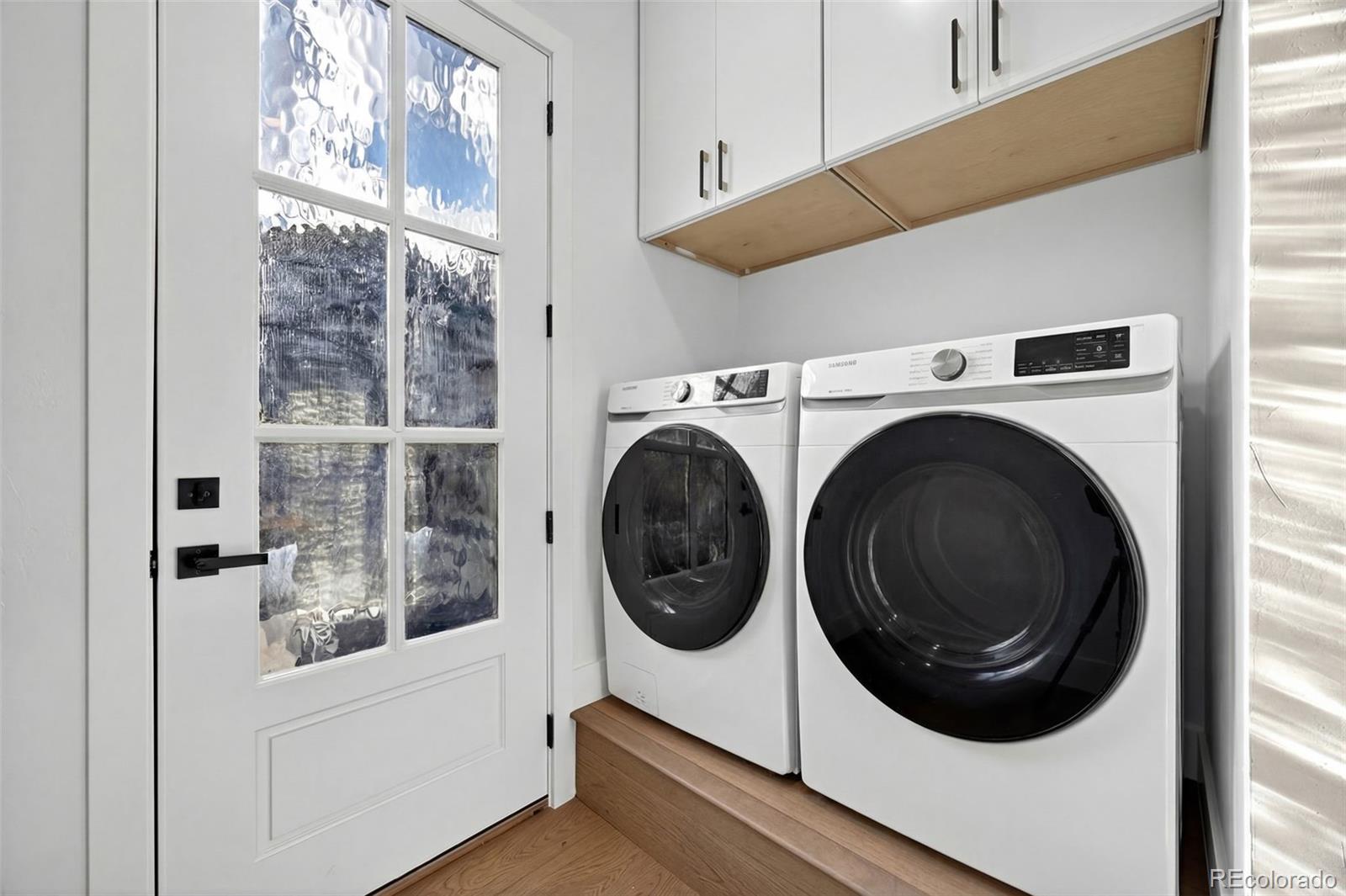 5175 Raleigh Street Denver, CO 80212 - Photo 16 of 49 a utility room with dryer and washer