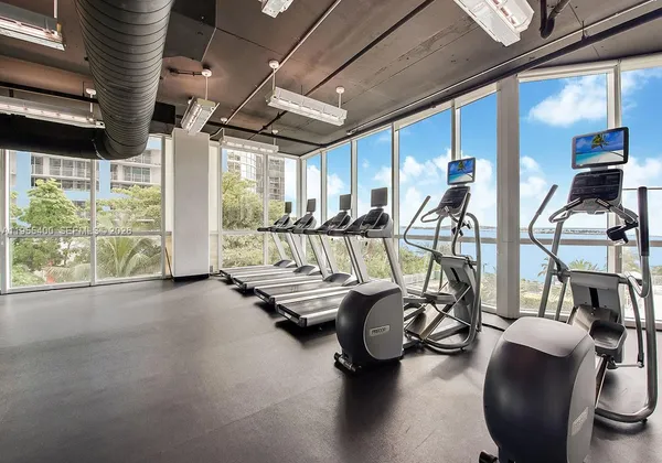 a view of a room with gym equipment