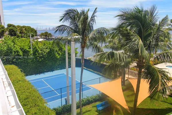 a view of a park with palm trees