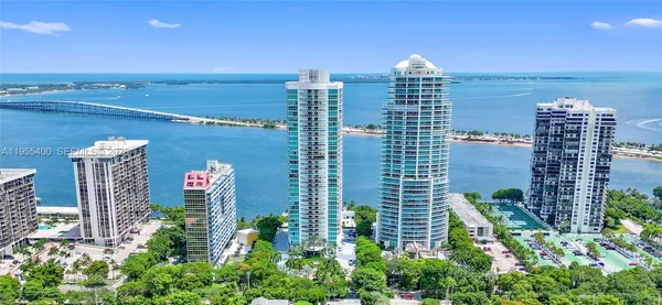 a view of a city with tall buildings