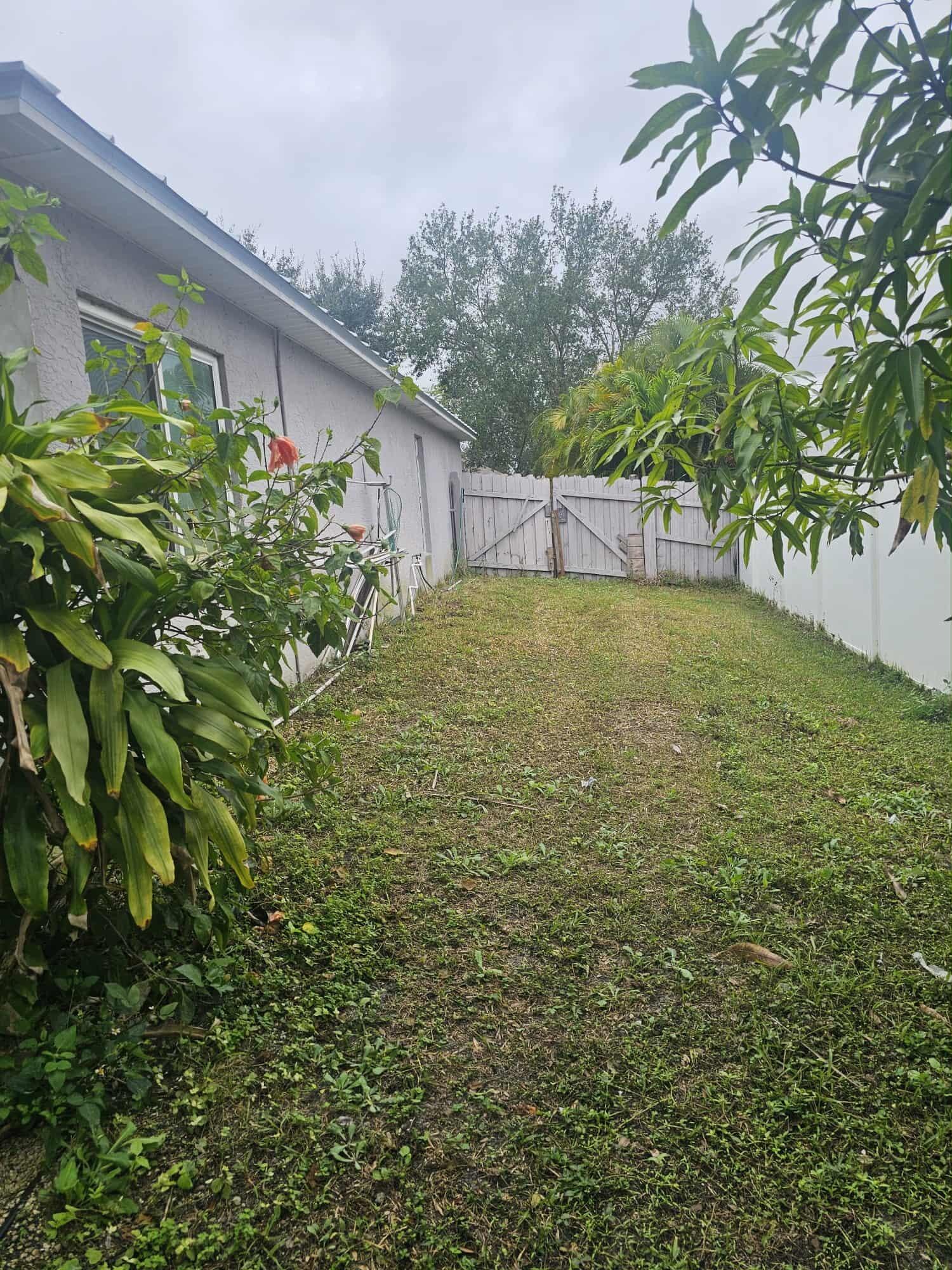 3641 Southwest Parsons Street Port St. Lucie, FL 34953 - Photo 11 of 11 a view of a backyard