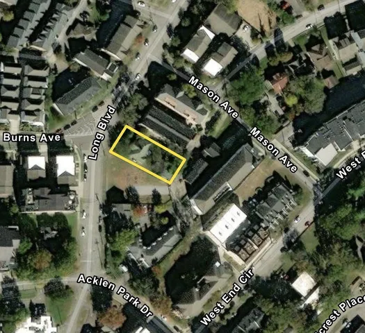 a view of a bedroom with a bed