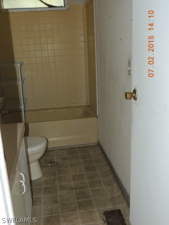 195 G Road LaBelle, FL 33935 - Photo 4 of 9 a bathroom with a shower