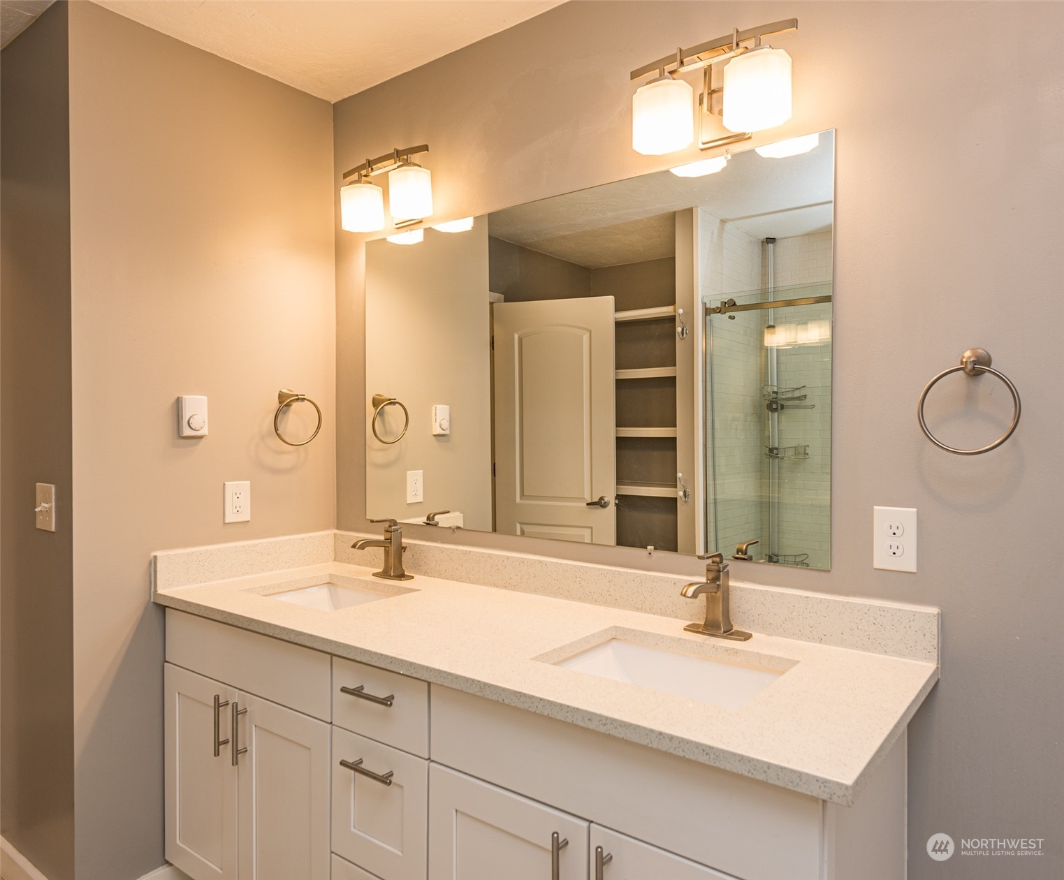 146 Sunset Place Sequim, WA 98382 - Photo 20 of 40 a bathroom with a sink and a mirror