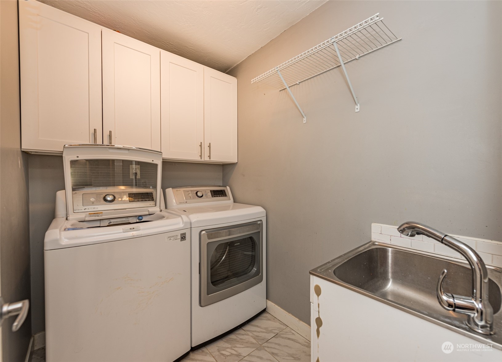 146 Sunset Place Sequim, WA 98382 - Photo 27 of 40 a utility room with dryer and washer