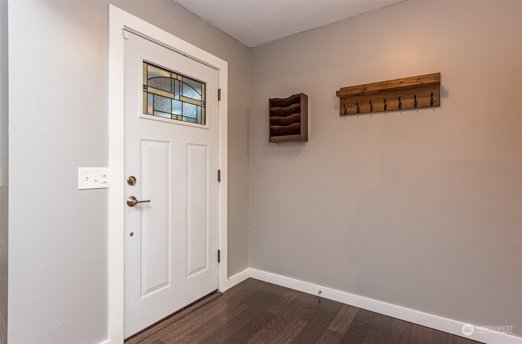 146 Sunset Place Sequim, WA 98382 - Photo 3 of 40 a view of an empty room with wooden floor