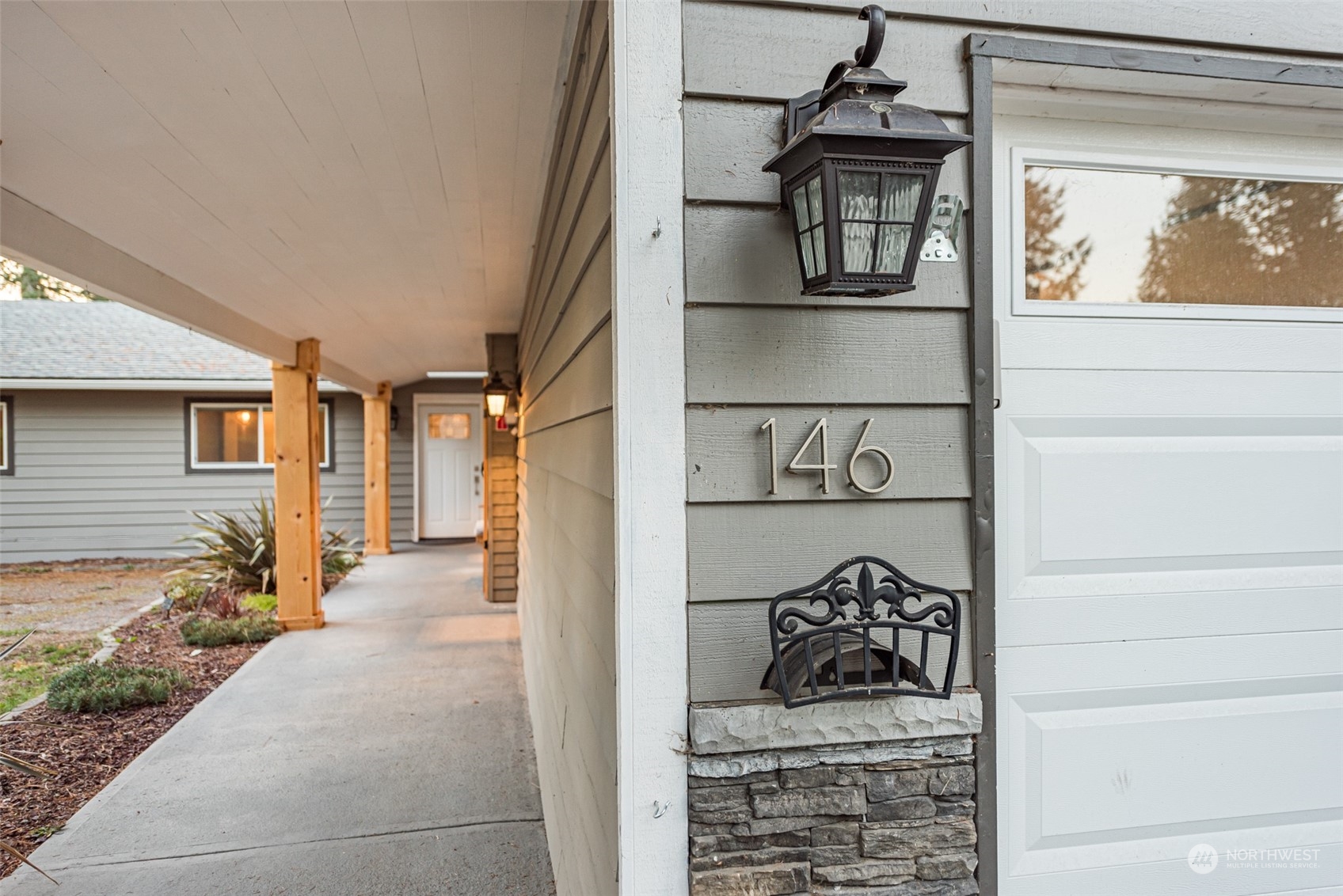 146 Sunset Place Sequim, WA 98382 - Photo 32 of 40 a view of front door and bedroom