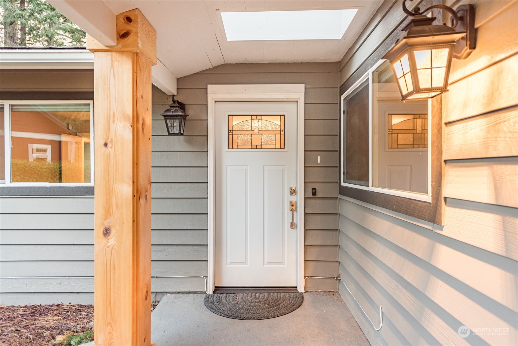146 Sunset Place Sequim, WA 98382 - Photo 35 of 40 a view of front door of house with stairs