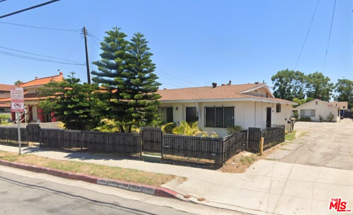 11100 Lower Azusa Road El Monte, CA 91731 - Photo 1 of 2 a front view of a house with a yard