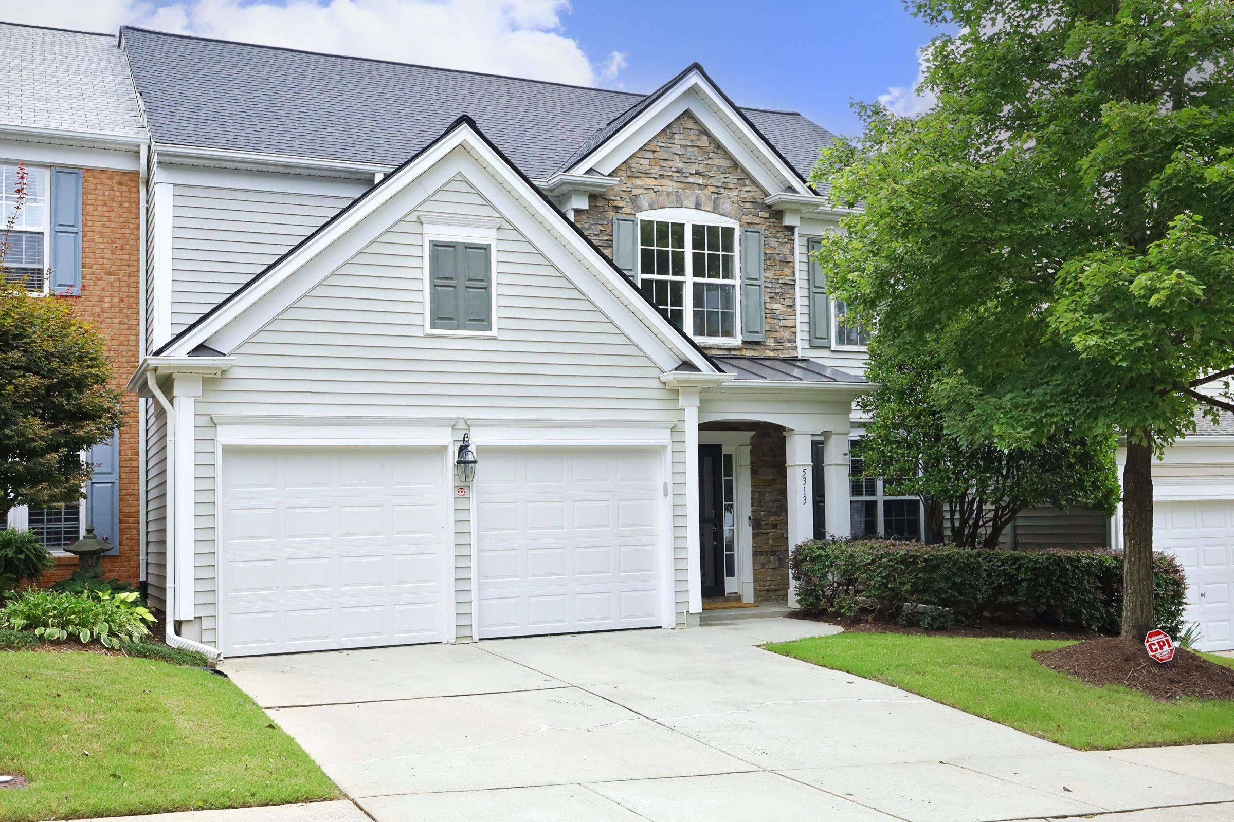 5313 Brandy Bay Road Raleigh, NC 27613 - Photo 1 of 42 a view of house with yard and parking