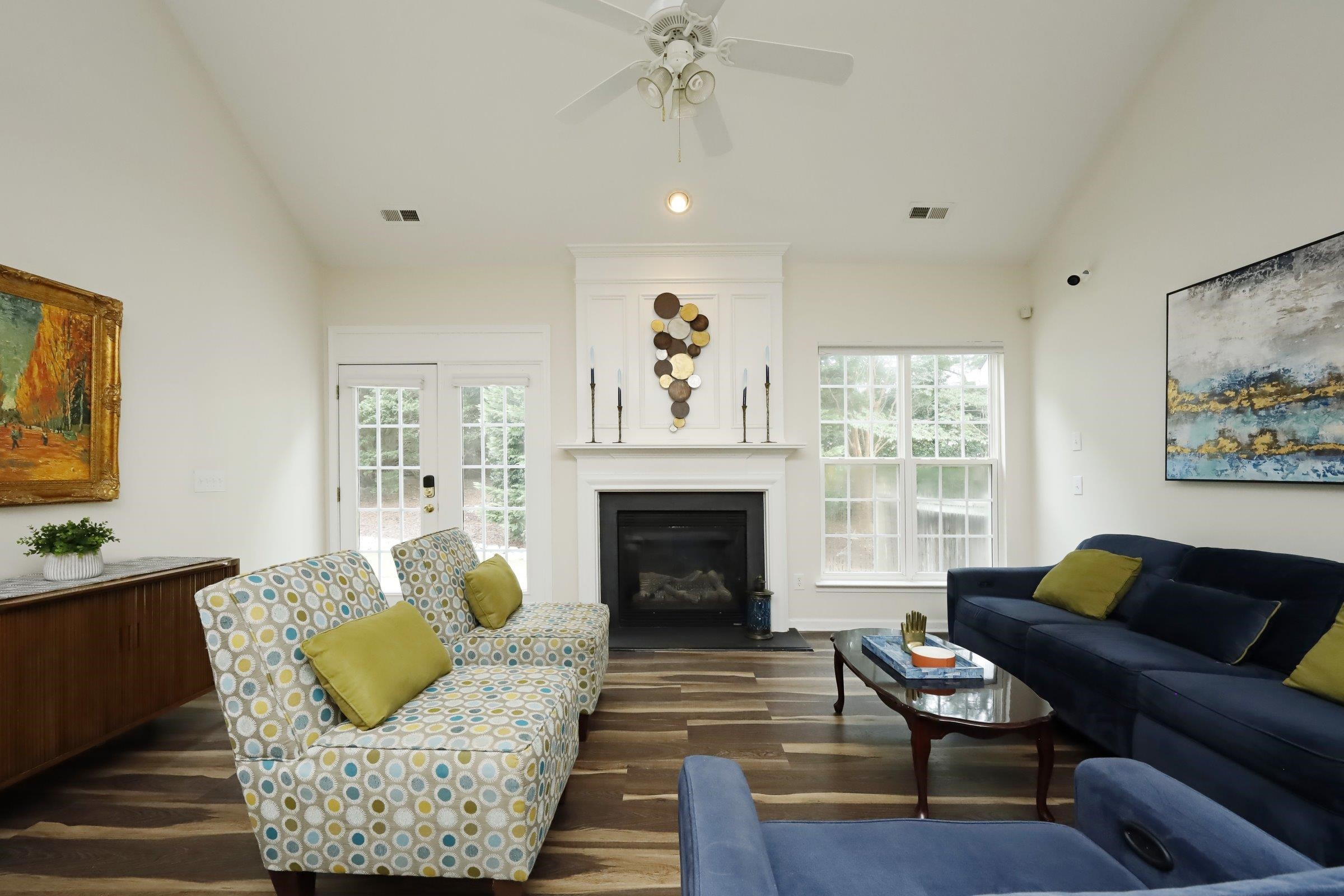 5313 Brandy Bay Road Raleigh, NC 27613 - Photo 14 of 42 a living room with furniture and a fireplace