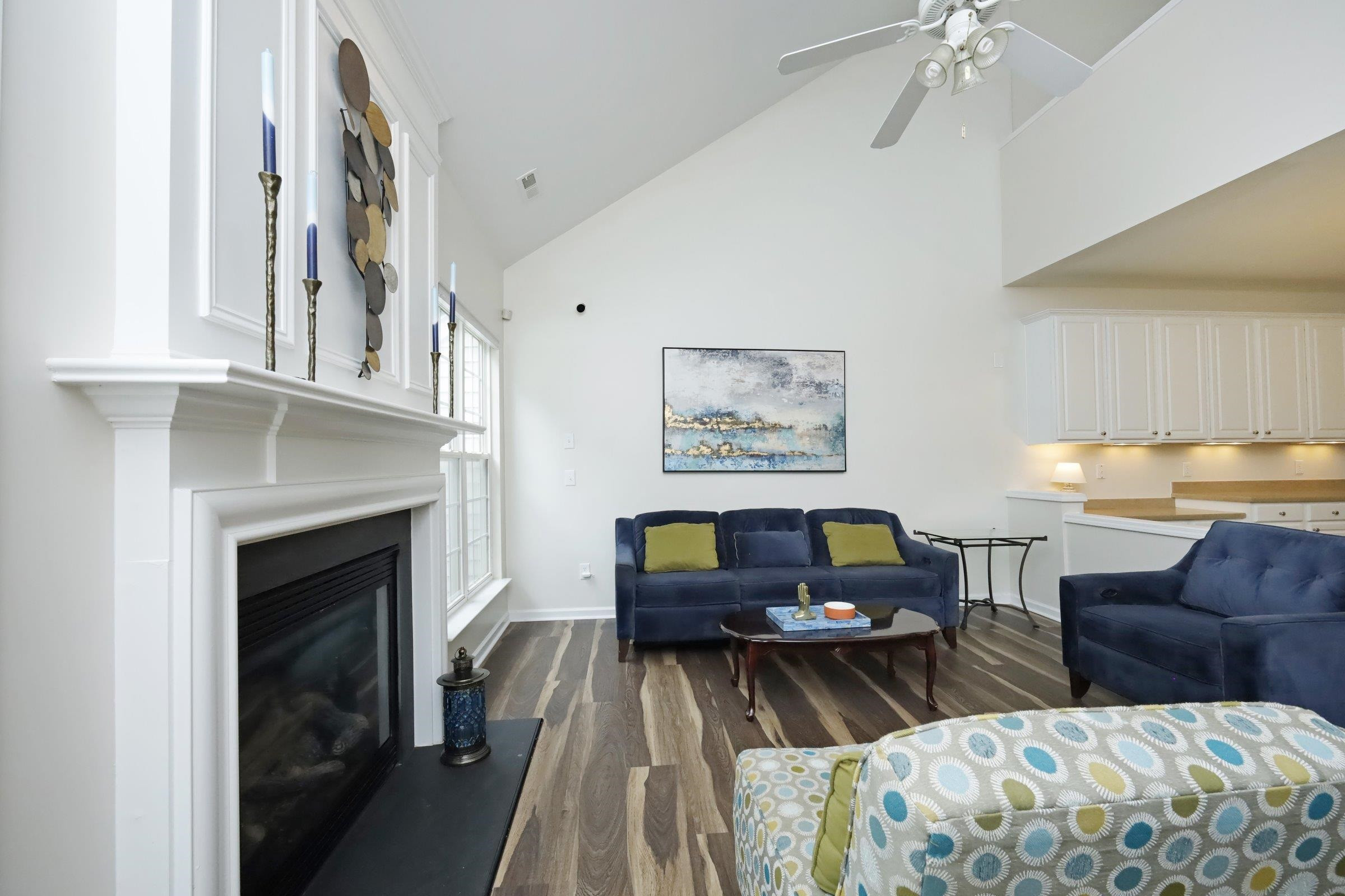 5313 Brandy Bay Road Raleigh, NC 27613 - Photo 16 of 42 a living room with furniture and a fireplace