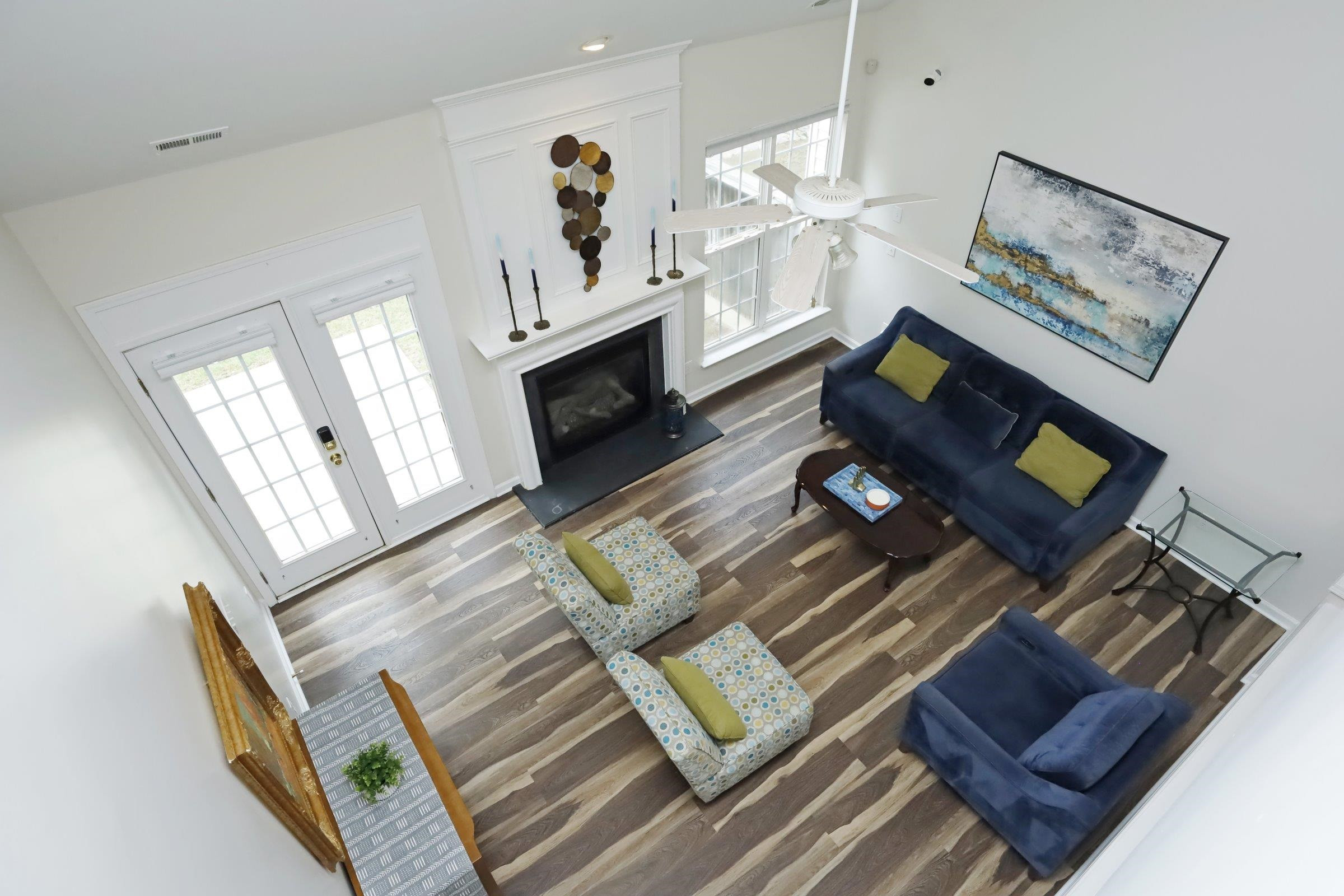 5313 Brandy Bay Road Raleigh, NC 27613 - Photo 17 of 42 a living room with furniture and a fireplace