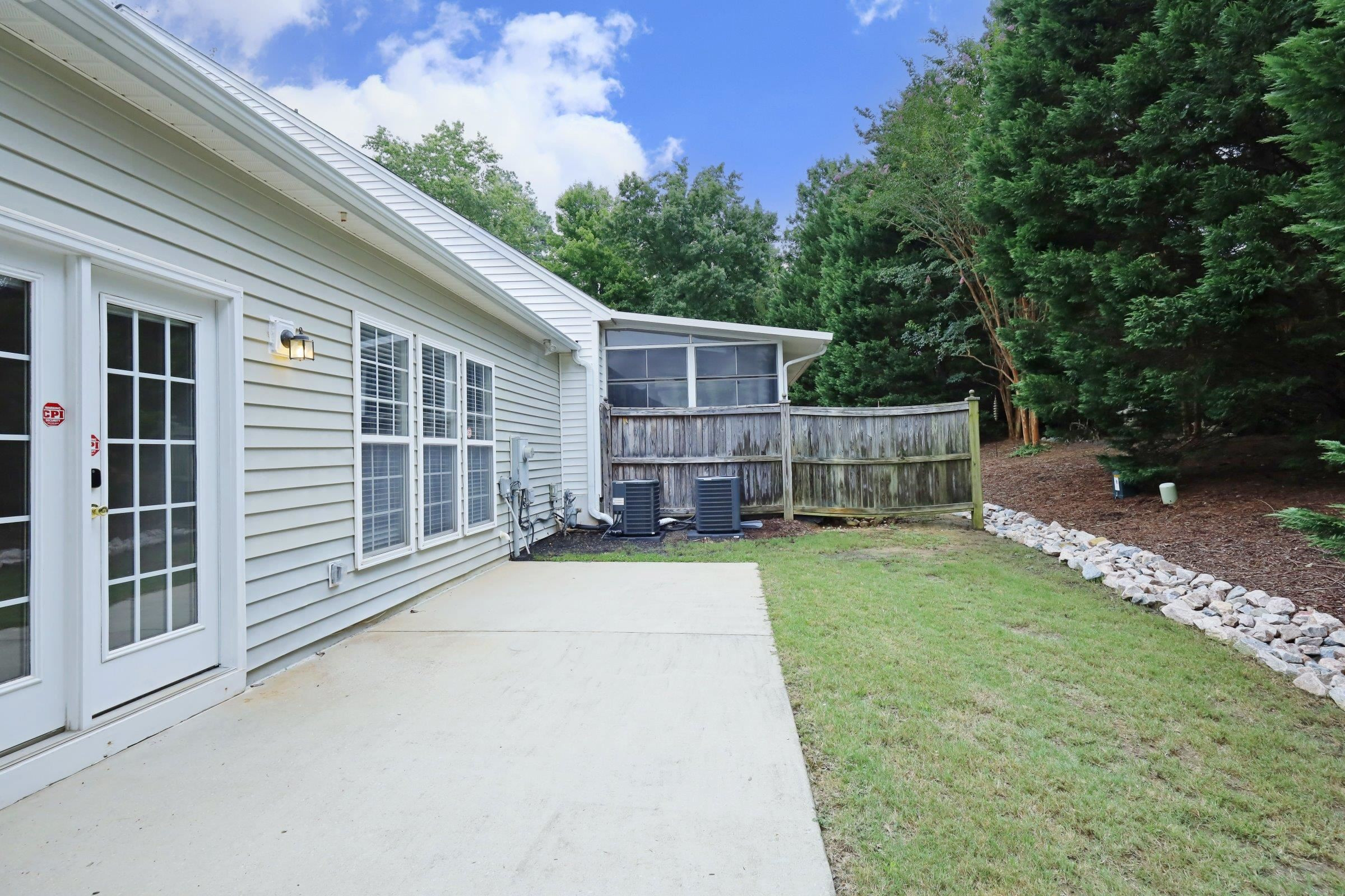 5313 Brandy Bay Road Raleigh, NC 27613 - Photo 38 of 42 a view of house with backyard and a garden