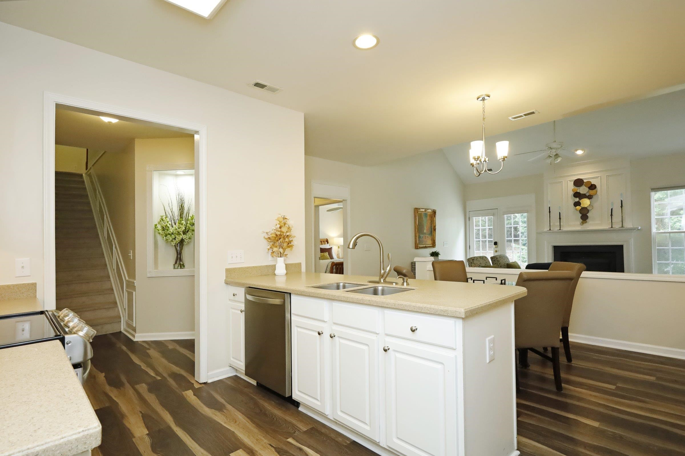 5313 Brandy Bay Road Raleigh, NC 27613 - Photo 7 of 42 a view of a a dining table chairs and a sink