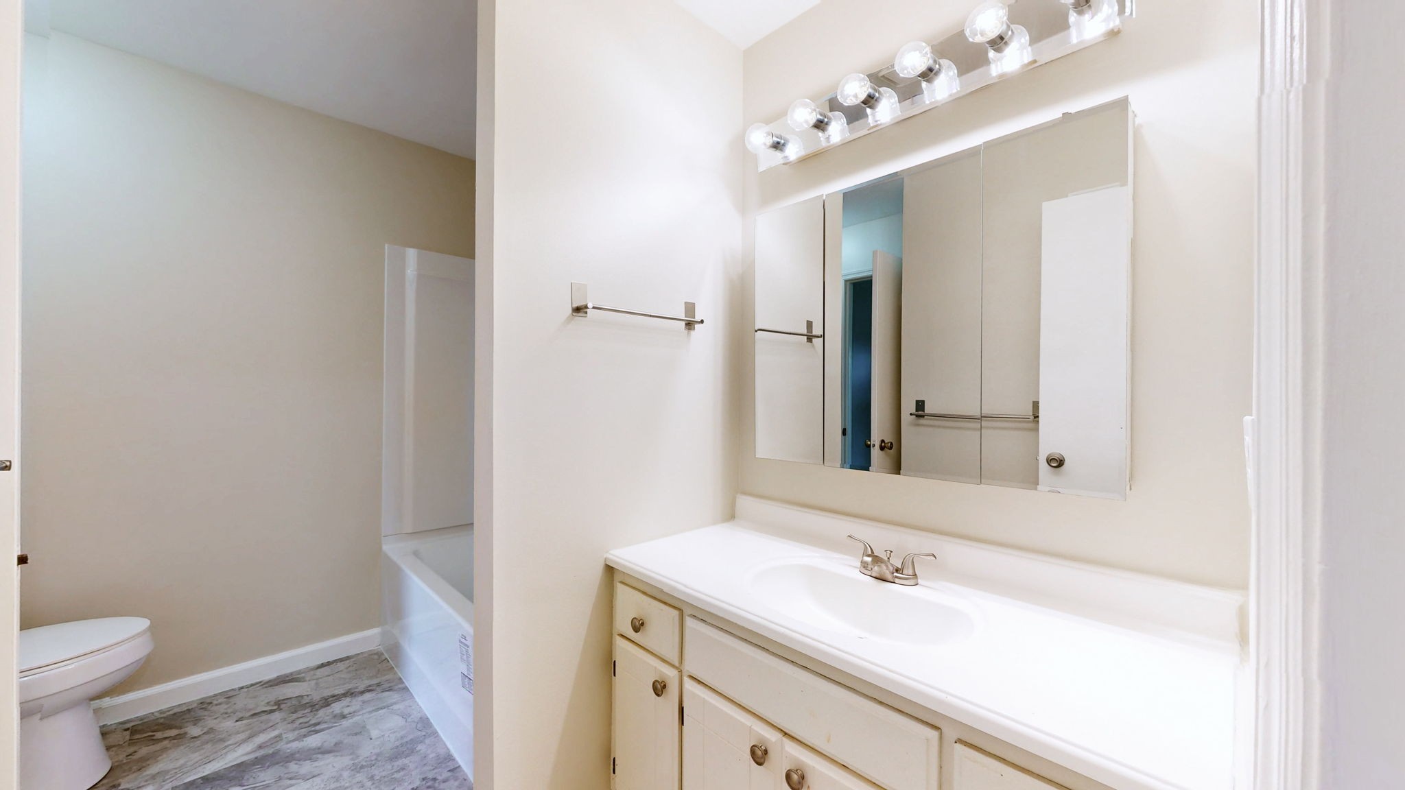 250 Sanders Ferry Road, Unit 34 Hendersonville, TN 37075 - Photo 14 of 21 a bathroom with a sink a toilet and a mirror