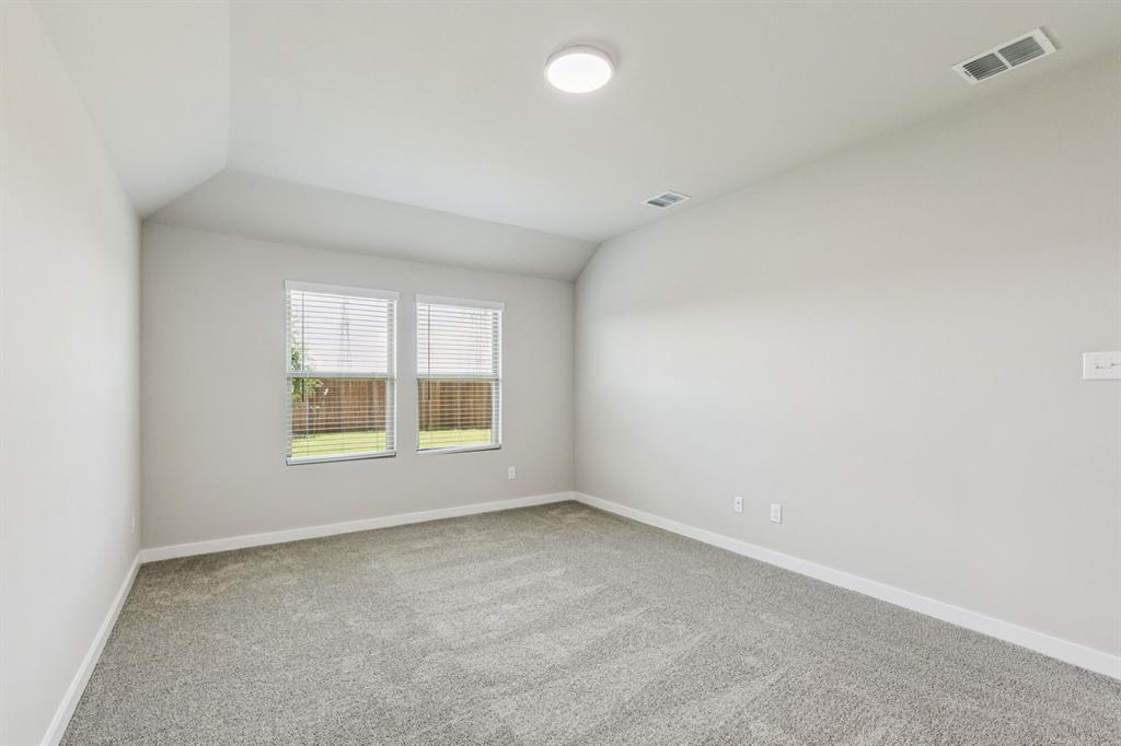 885 Rockcloud Drive Haslet, TX 76052 - Photo 15 of 27 Primary Suite in the Harper home plan by Trophy Signature Homes – REPRESENTATIVE PHOTO