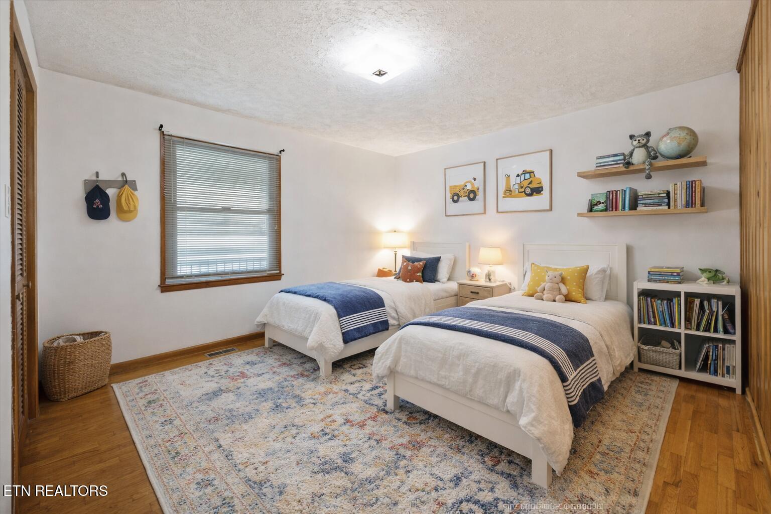 8237 Collier Road Powell, TN 37849 - Photo 12 of 31 Cozy children's bedroom with colorful ac