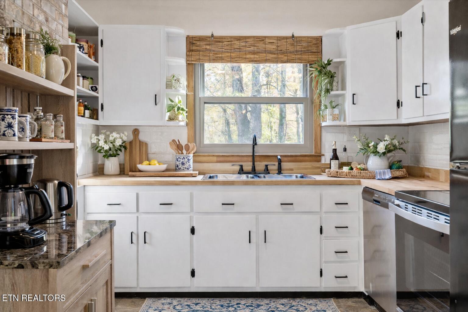 8237 Collier Road Powell, TN 37849 - Photo 9 of 31 Bright kitchen with autumn view