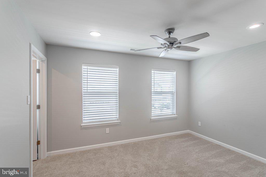 70 Morley Boulevard Medford, NJ 08055 - Photo 19 of 32 a view of an empty room with windows