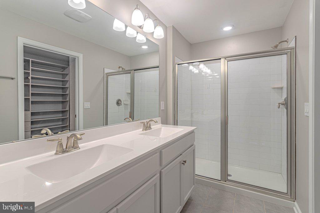 70 Morley Boulevard Medford, NJ 08055 - Photo 28 of 32 a bathroom with a sink double vanity and a mirror