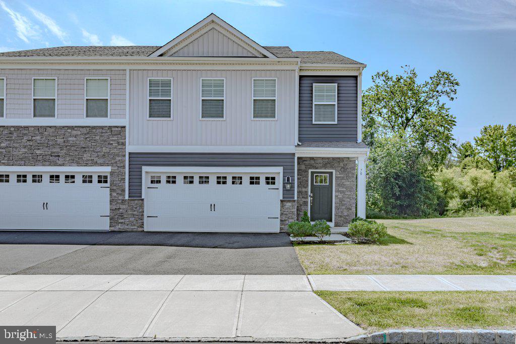 70 Morley Boulevard Medford, NJ 08055 - Photo 4 of 32 a front view of a house with yard