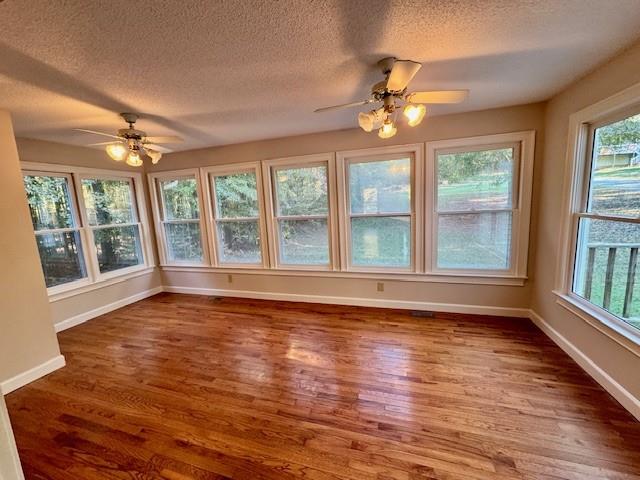 999 Grassdale Road Northwest Cartersville, GA 30121 - Photo 12 of 54 a view of an empty room with wooden floor and a window