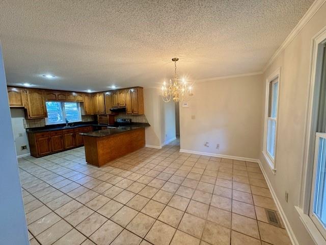 999 Grassdale Road Northwest Cartersville, GA 30121 - Photo 14 of 54 a kitchen with stainless steel appliances a sink and a refrigerator