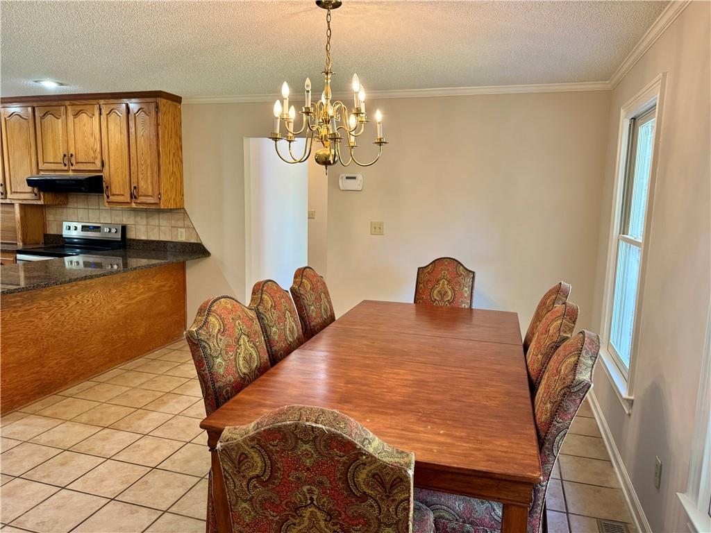999 Grassdale Road Northwest Cartersville, GA 30121 - Photo 15 of 54 a view of a dining room with furniture