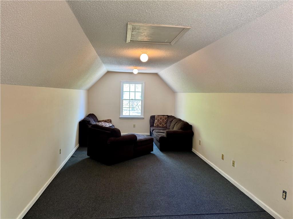 999 Grassdale Road Northwest Cartersville, GA 30121 - Photo 29 of 54 a living room with furniture and a window