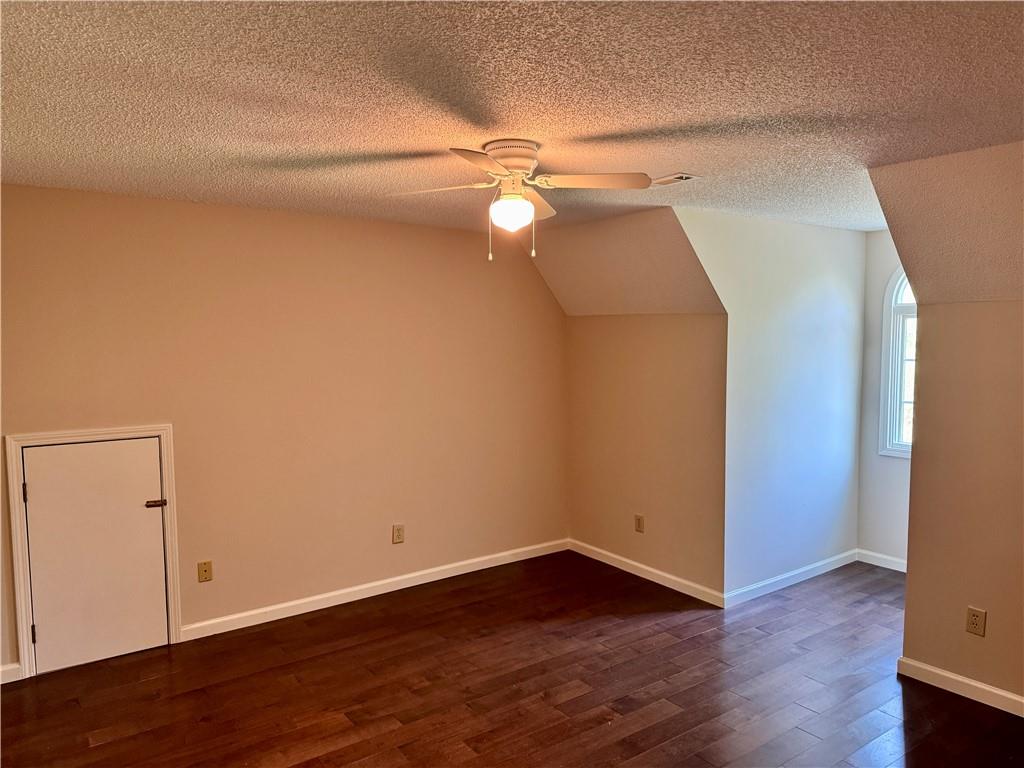 999 Grassdale Road Northwest Cartersville, GA 30121 - Photo 32 of 54 a view of empty room with wooden floor