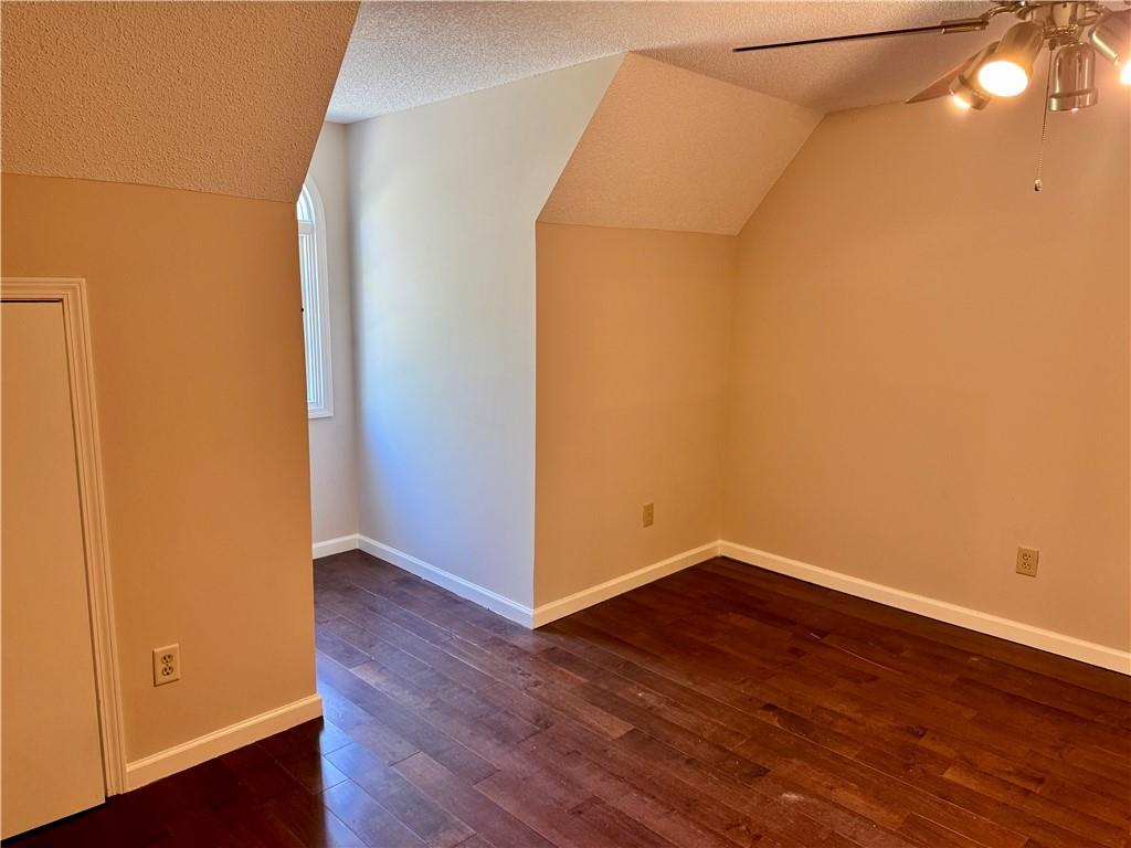 999 Grassdale Road Northwest Cartersville, GA 30121 - Photo 38 of 54 a view of empty room with wooden floor