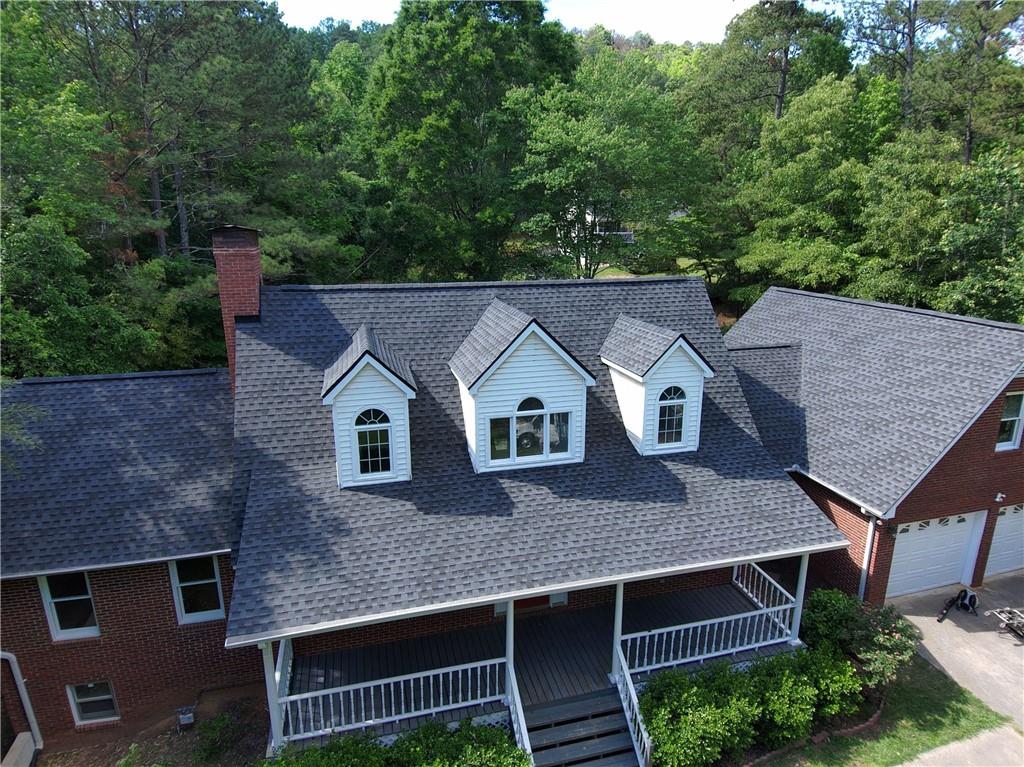999 Grassdale Road Northwest Cartersville, GA 30121 - Photo 4 of 54 an aerial view of a house with a yard