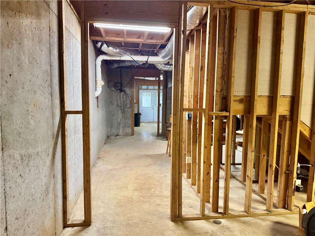 999 Grassdale Road Northwest Cartersville, GA 30121 - Photo 43 of 54 a view of a hallway with wooden floor