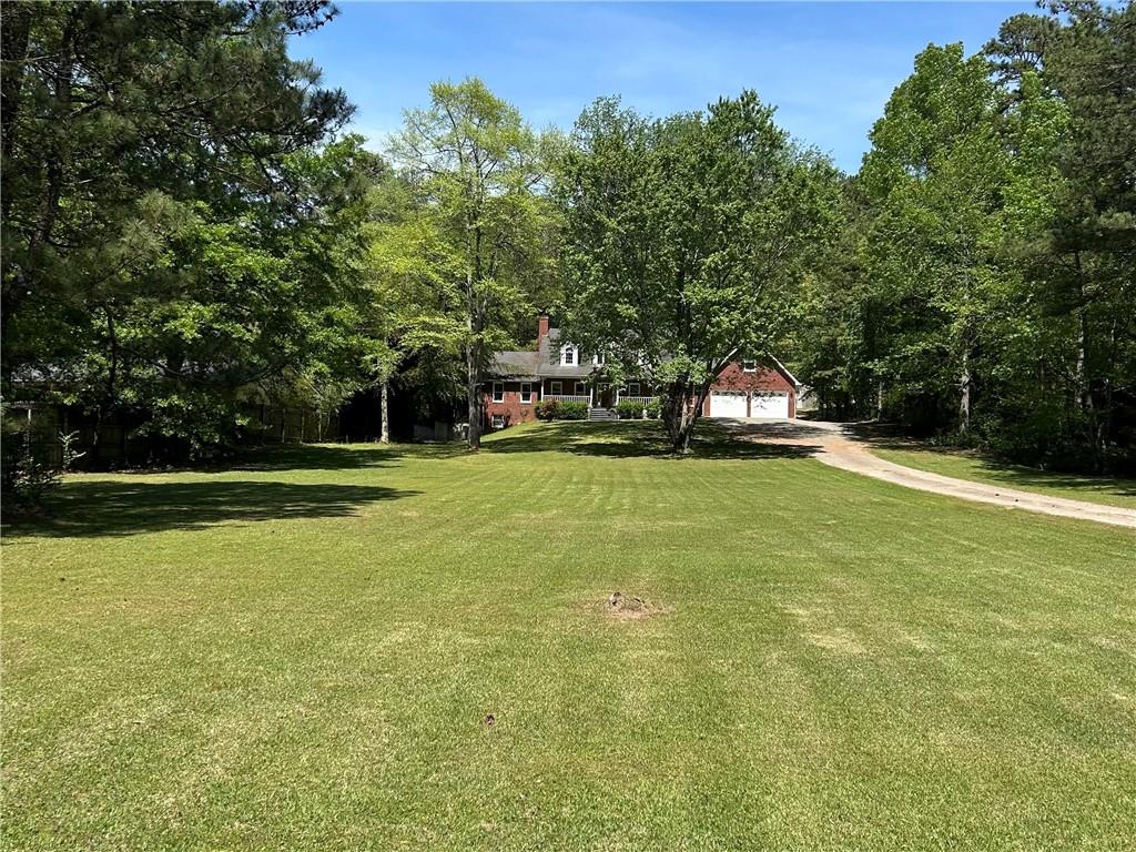 999 Grassdale Road Northwest Cartersville, GA 30121 - Photo 50 of 54 a view of yard with swimming pool and green space