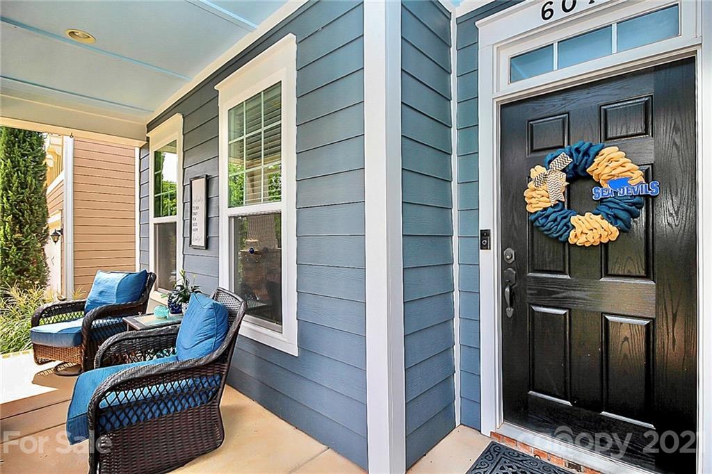 6012 Fallondale Road Waxhaw, NC 28173 - Photo 3 of 45 a outdoor living space with patio furniture and a potted plant