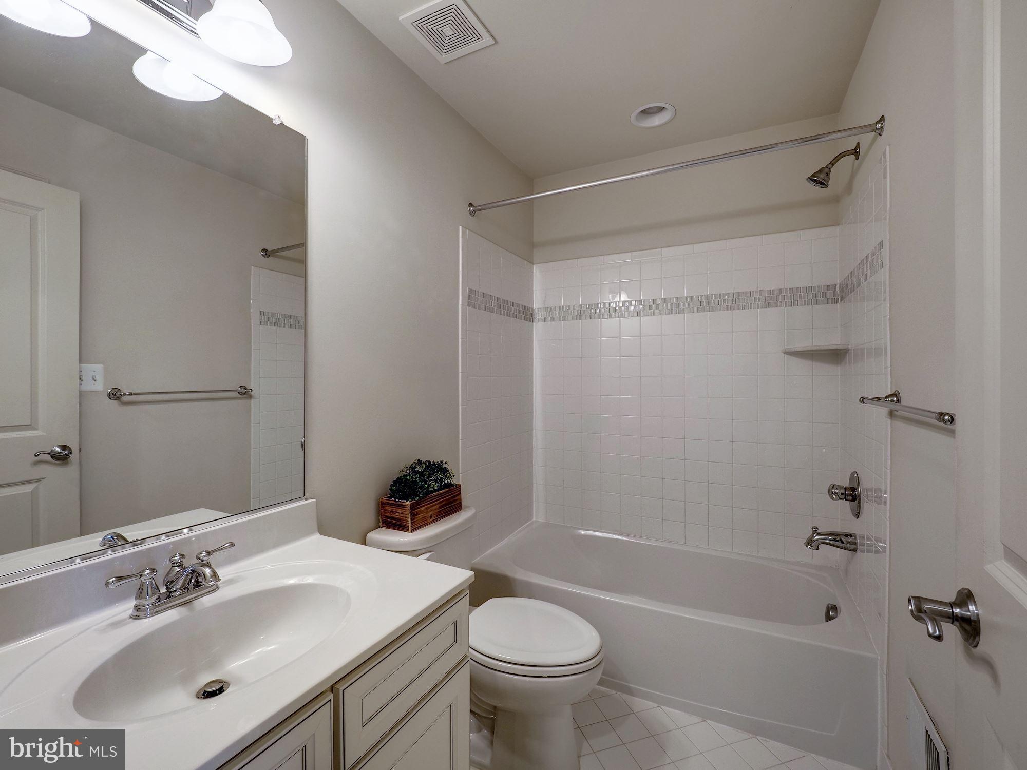 14052 Wellspring Avenue Clarksburg, MD 20871 - Photo 13 of 21 High-end tiling in Hall Full Bath