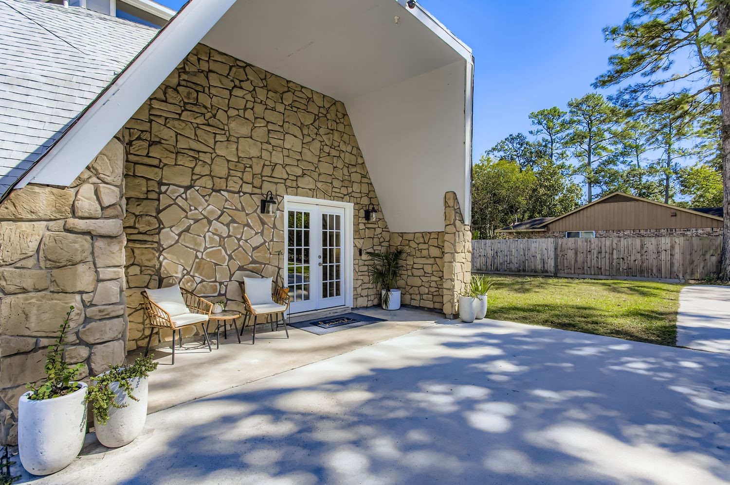 16614 Creeksouth Road Houston, TX 77068 - Photo 2 of 36 a view of backyard with outdoor seating and plants