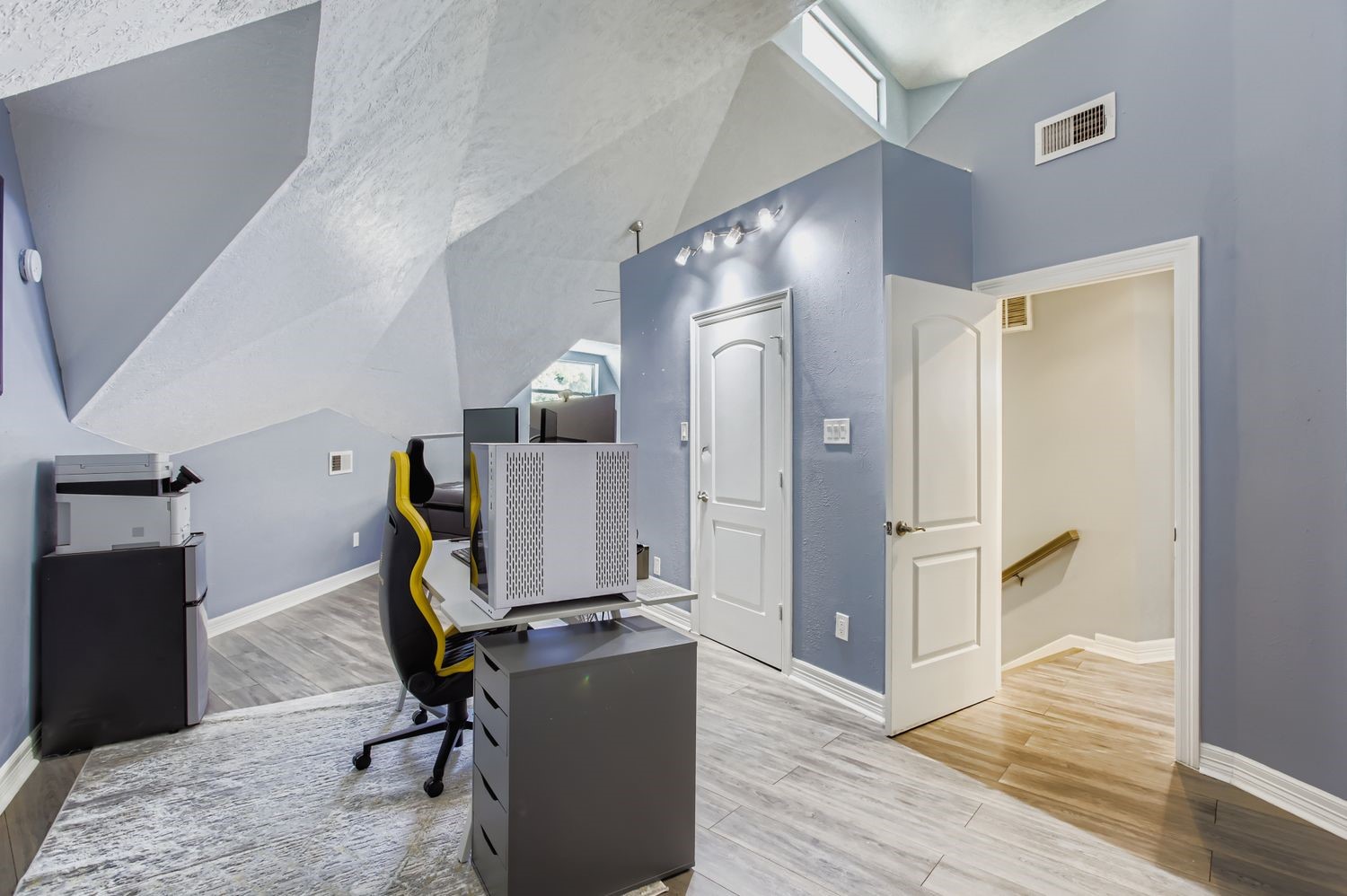 16614 Creeksouth Road Houston, TX 77068 - Photo 22 of 36 a view of a workspace with furniture and wooden floor